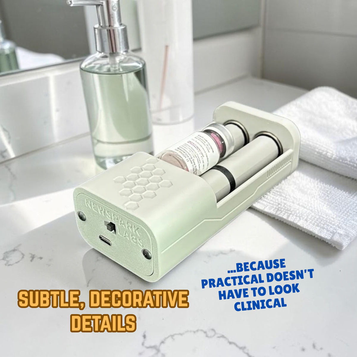 A gray, portable electronic vial rolling device with a honeycomb pattern on top, shown on a bathroom counter. one small cylindrical vial sits inside, nestled between two rollers. Text overlay says, 'Subtle, Decorative Details ...because practical doesn't have to look clinical.'