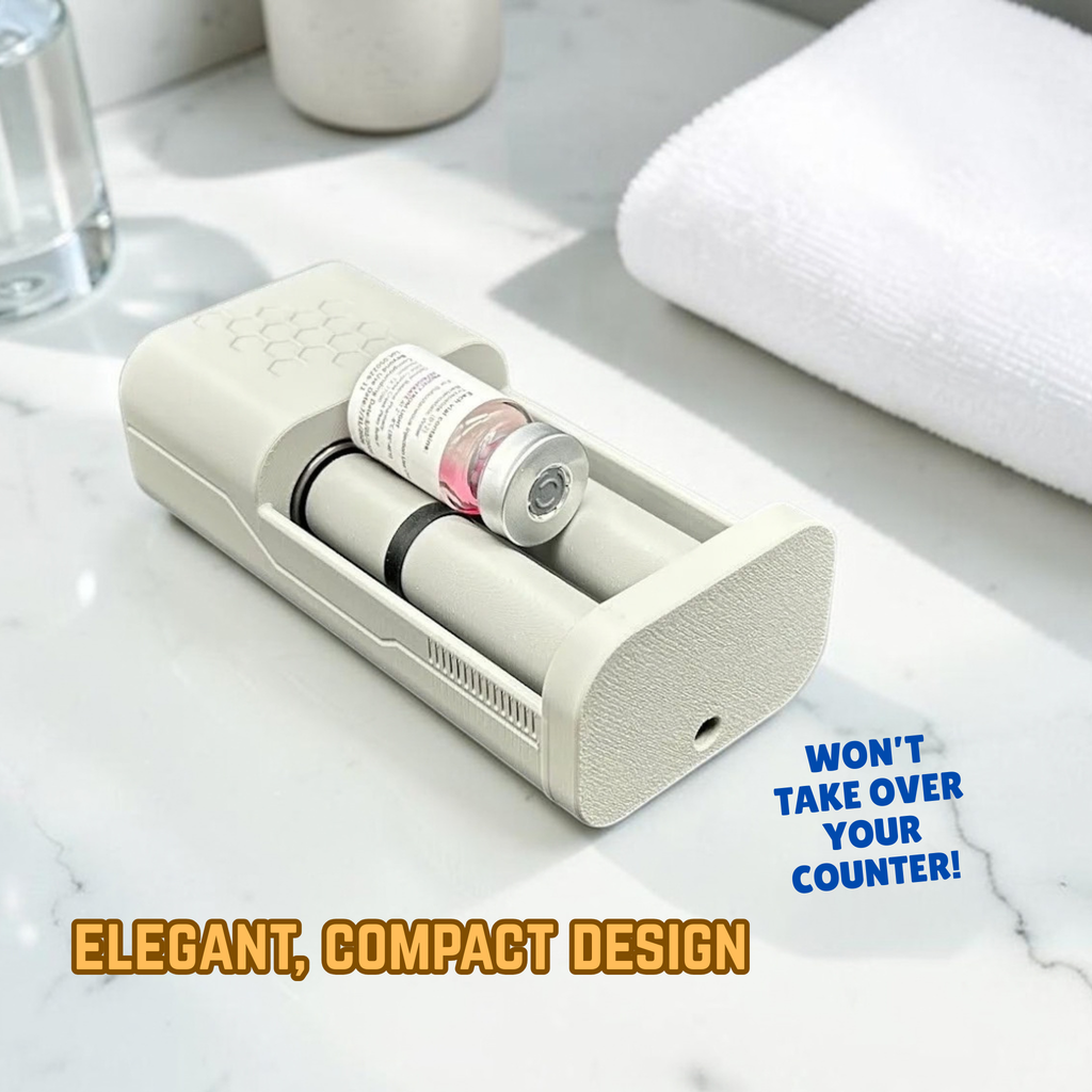 A compact, gray motorized vial roller holding one small vial between two rollers, on a white marble countertop, with a folded white towel and glass in the background. Text overlays read 'ELEGANT, COMPACT DESIGN' and 'WON'T TAKE OVER YOUR COUNTER!'.