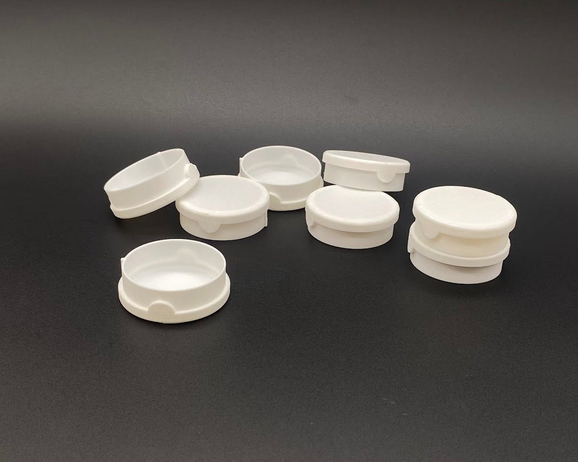 White caps on a black background