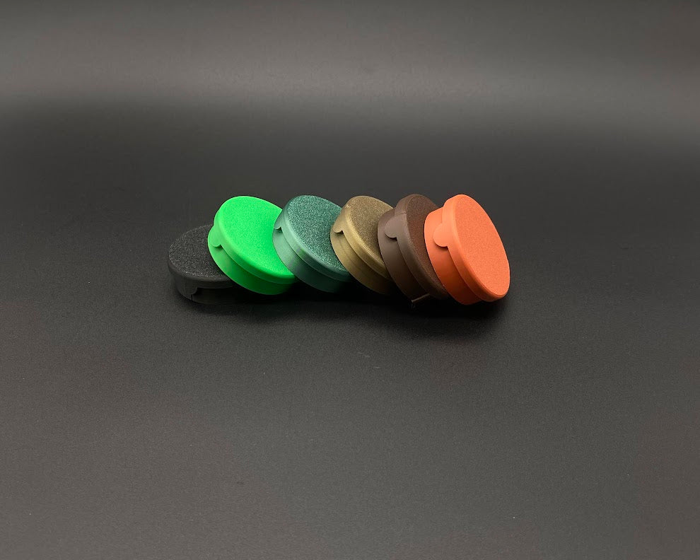 Five colorful circular objects on a gray background