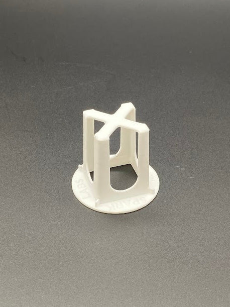 Small white plastic basket on a gray background