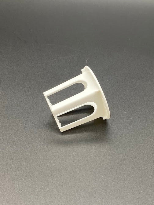 White plastic basket on a gray background