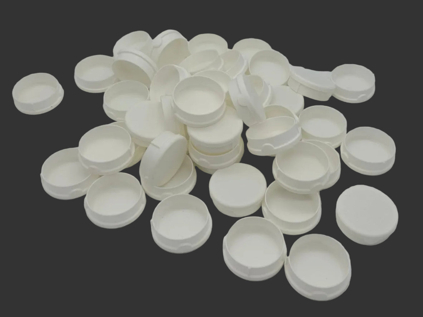 white caps on a black background